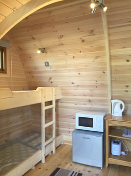 Camping Pods with private facilities